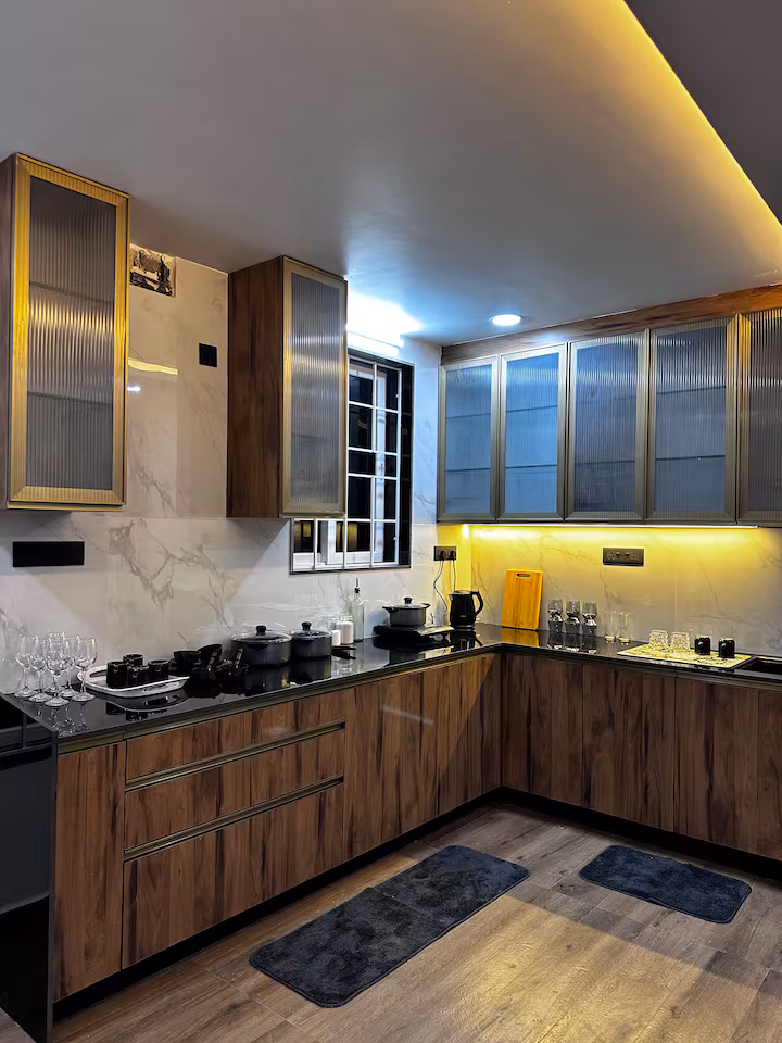Fully equipped modern kitchen with dining setup